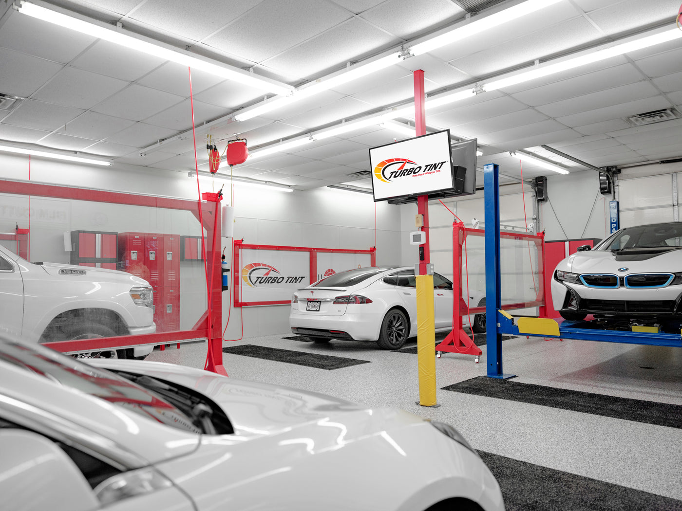 Turbo Tint White Cars in Installation Bay 